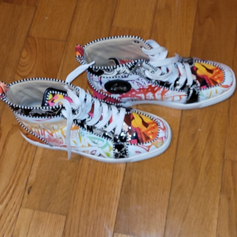 Christan Louboutin Hightop sneakers